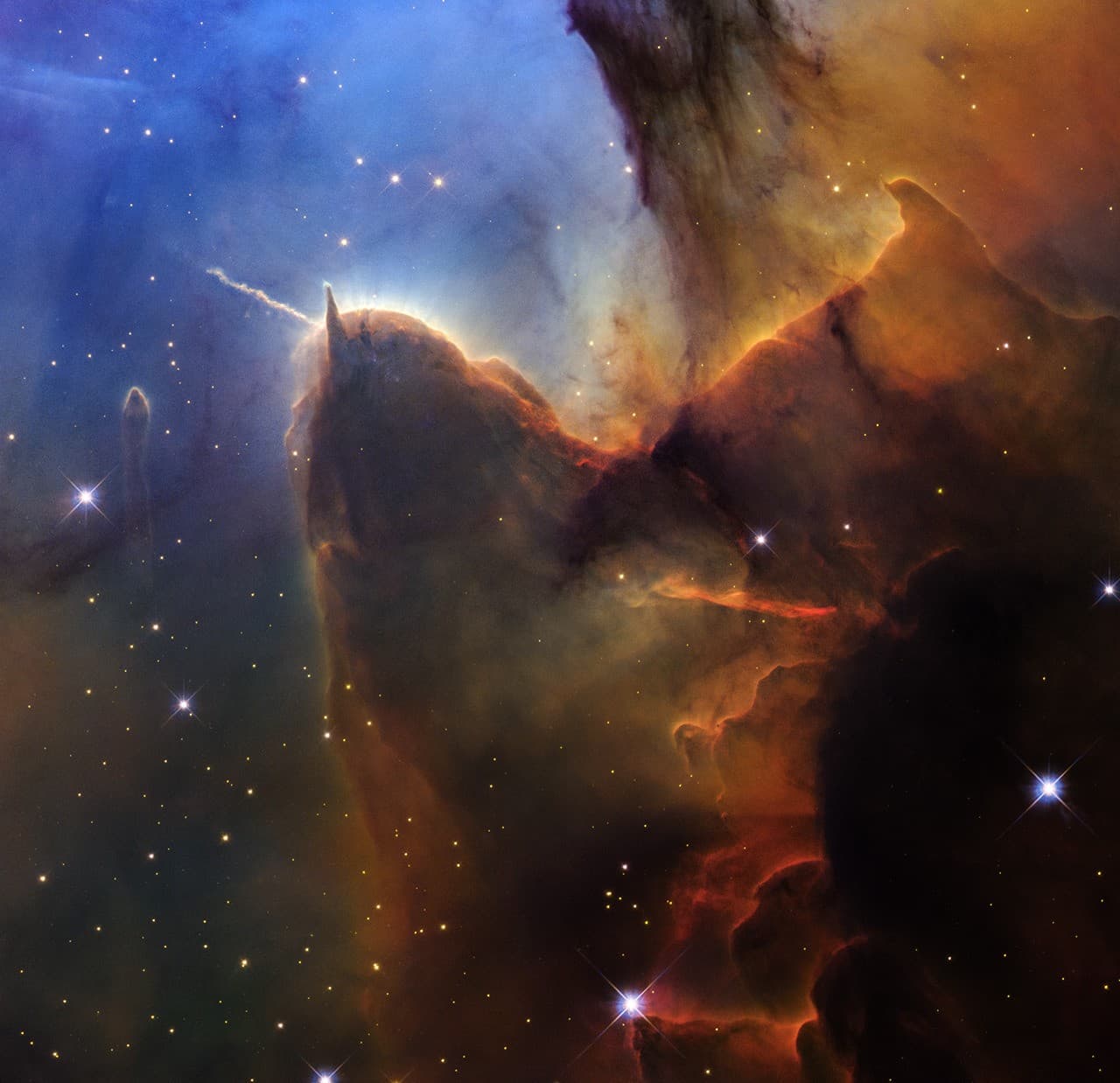 NASA'nın Hubble'ı Üç Boğum Bulutsusu'ndaki Genç Yıldızlarla Göz Kamaştırıyor