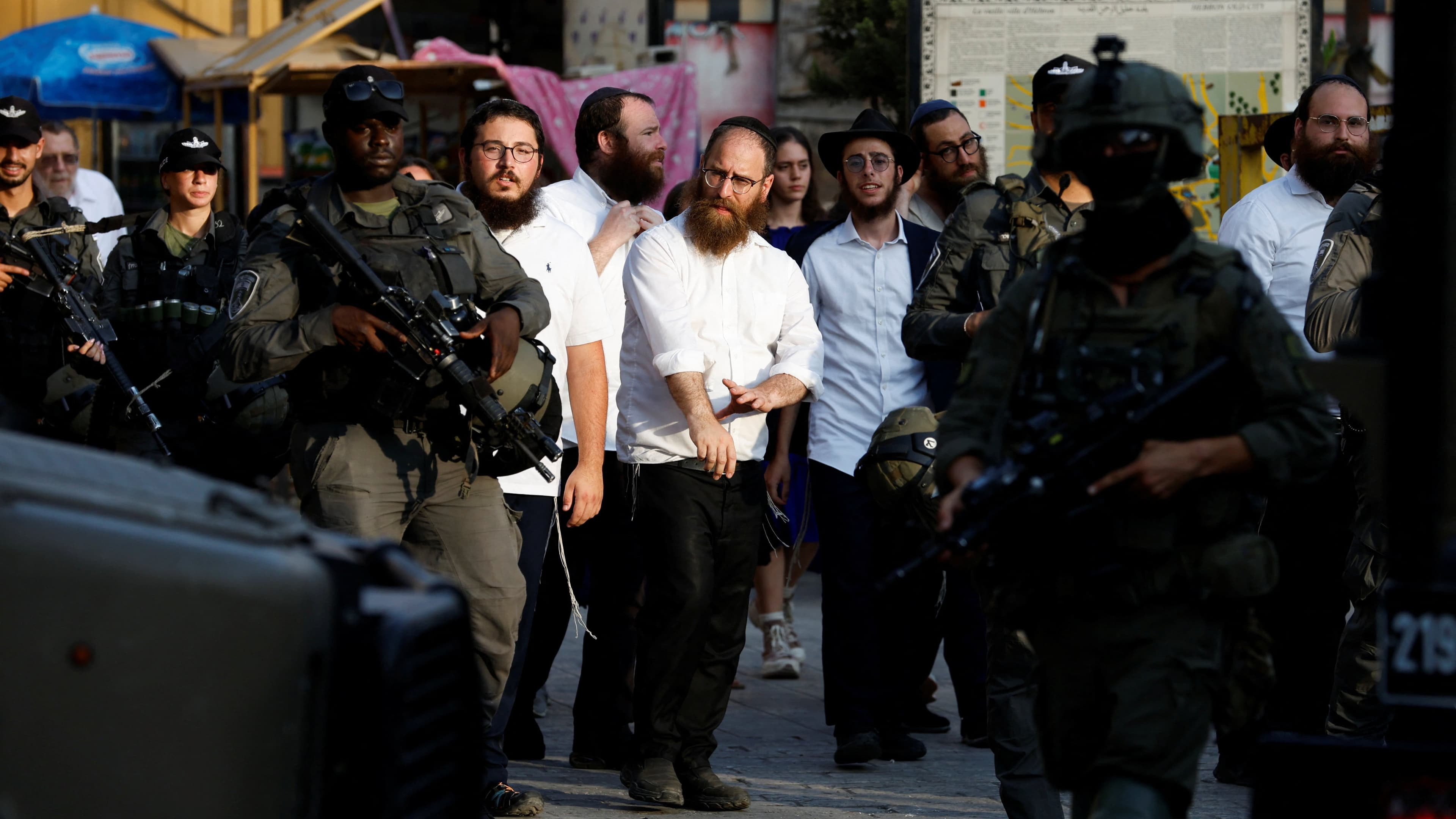 Israeli settlers shoot Palestinians and torch cars in latest West Bank assaults
